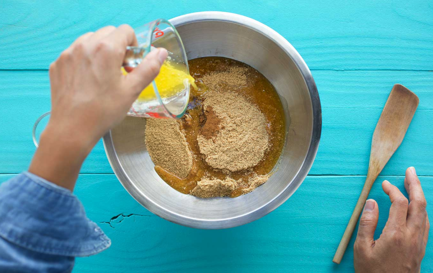 maxing graham cracker crumbs and sugar in a bowl